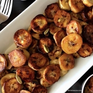 Sliced and roasted sweet plantains on a plate