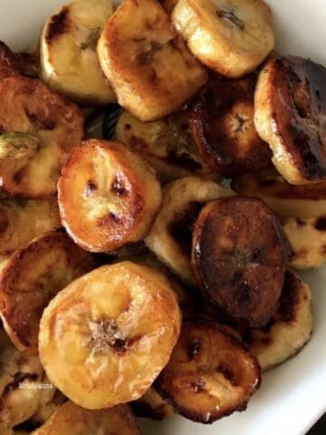 A pan is with sweet plantain on the table