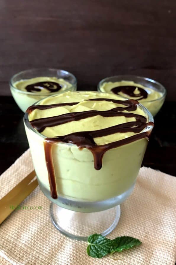 A cup of  Avocado mousse is on the table