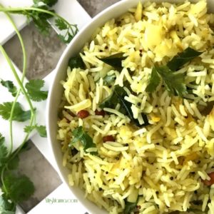 A bowl of Mango Rice and topped with cilantro