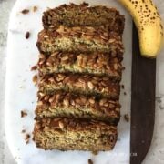 Banana Bread is sliced and served on the white serving tray
