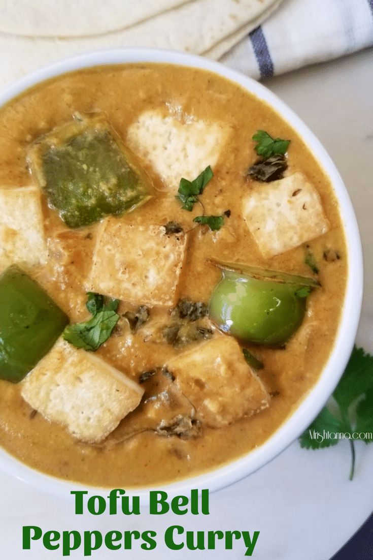 A bowl of food, with Tofu and Curry