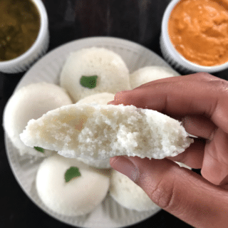 A piece of food on a plate, with Idli