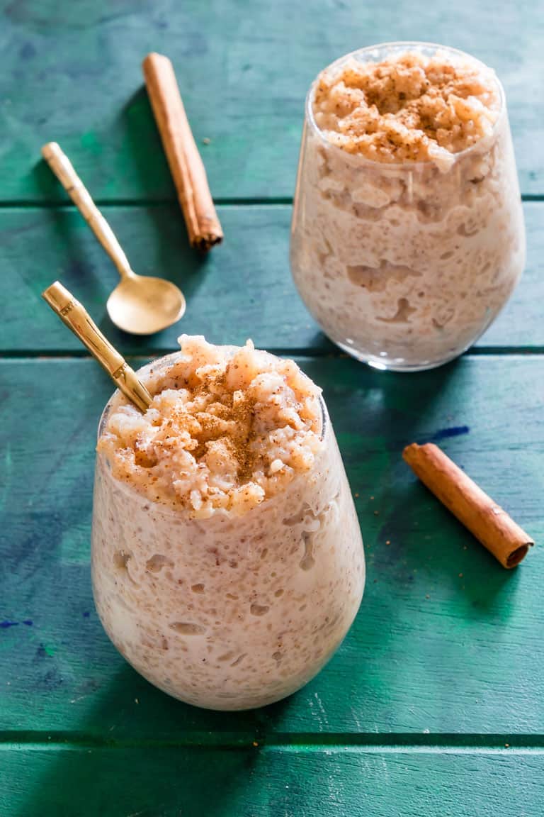 A close up of food on a table, with Rice and Pudding