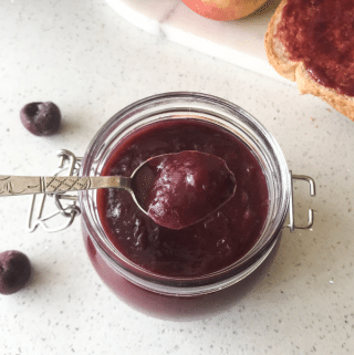 A bowl of food on a table, with Jam