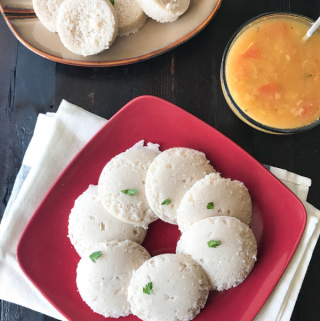 A close up of a batter, with Brown and Idli