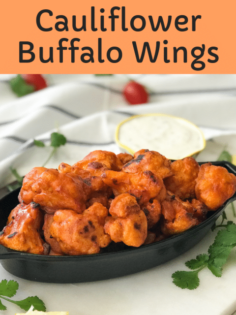 A plate of food with broccoli, with Cauliflower and Buffalo wing
