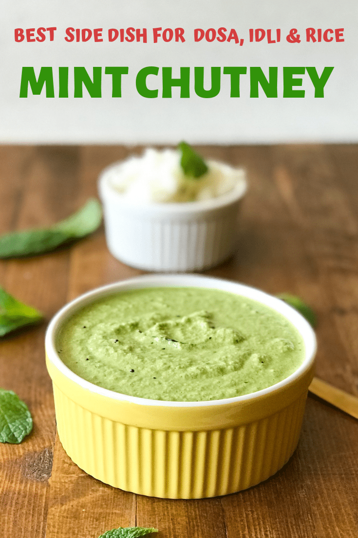 A bowl of pudina chutney is on the wooden table