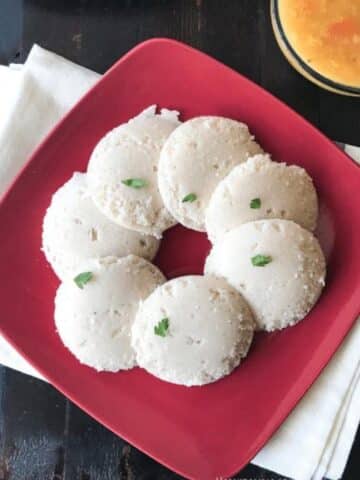 head shot of plate with brown rice idli.