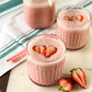 A glass of Lassi with Strawberry