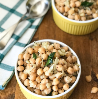 A bowl of chickpeas on a table