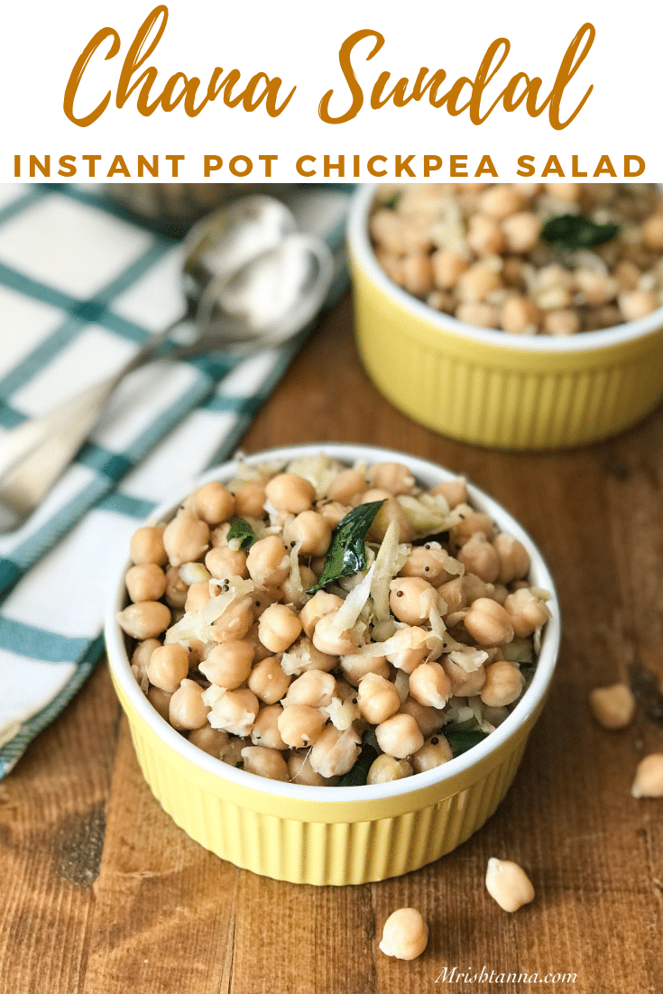 A bowl filled with chickpeas and grated raw mango