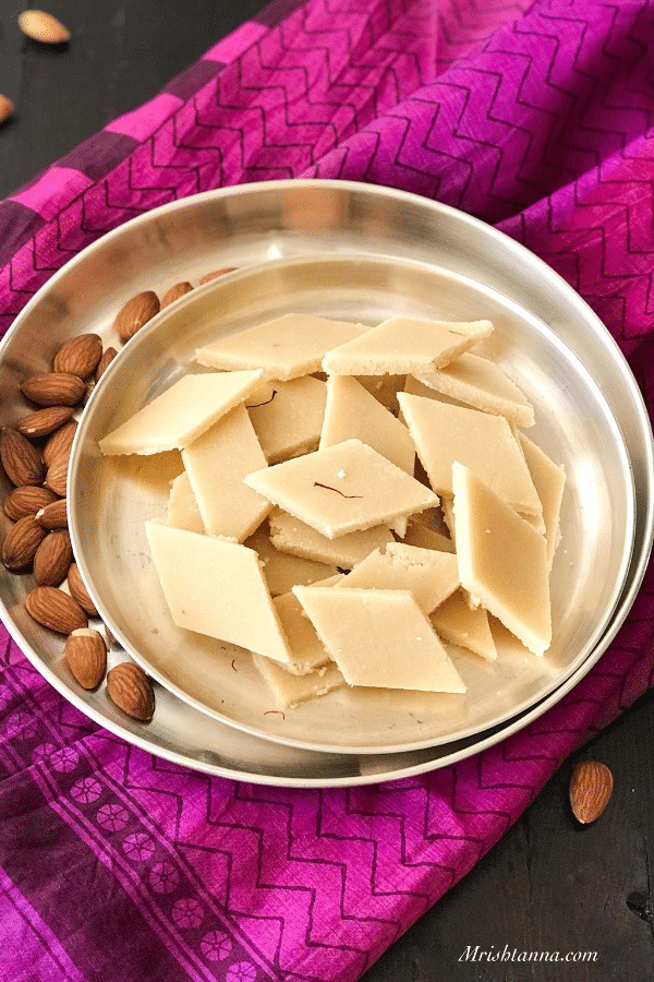 A silver plate filled with almond fudge or katli