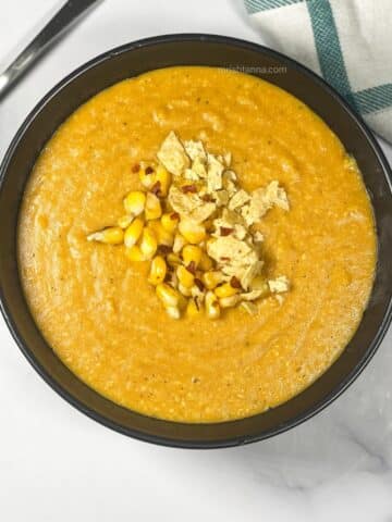 Vegan corn chowder is in the bowl.