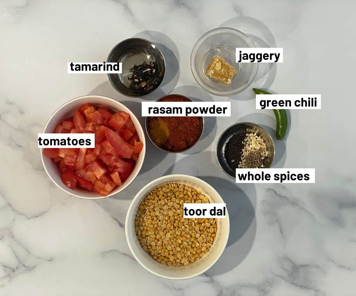 Tomato rasam ingredients are in the bowls.