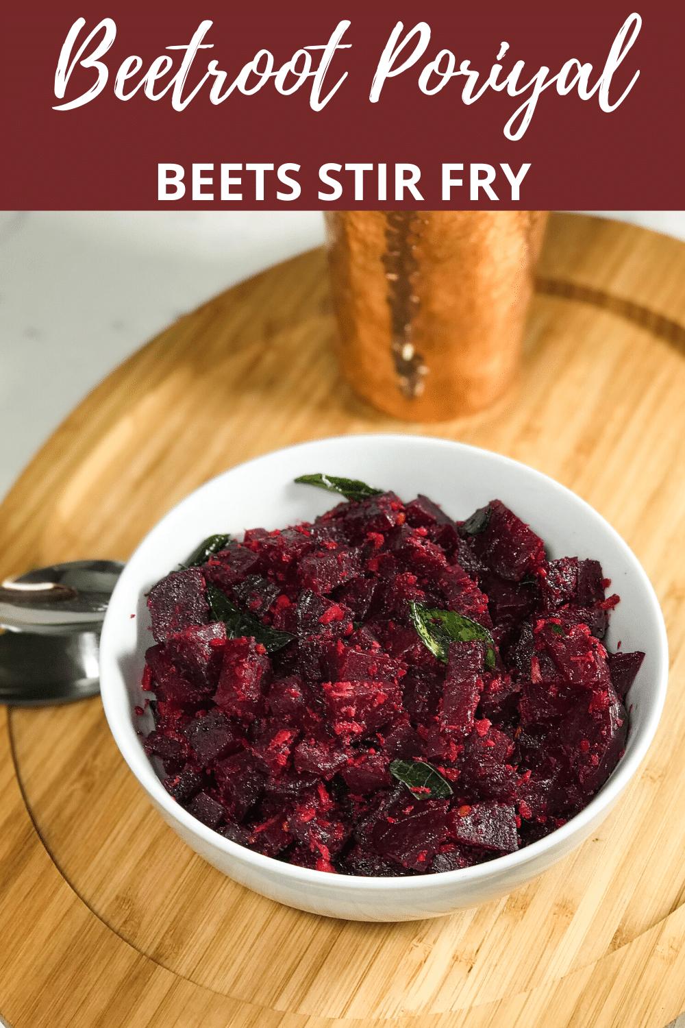 A bowl of food on a plate, with Beetroot and Curry