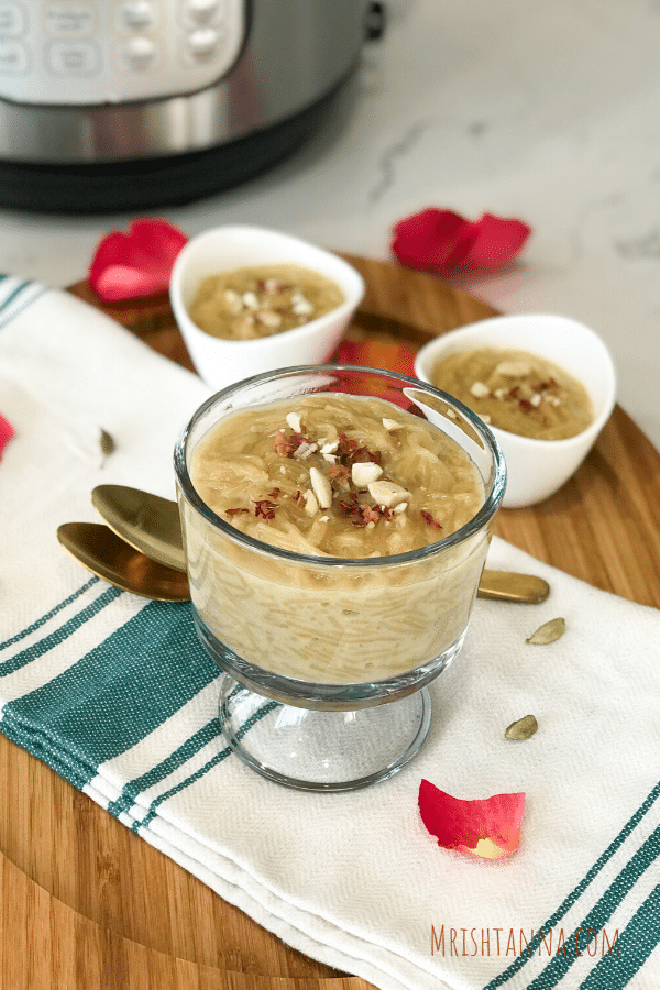A bowl of  Kheer and Vermicelli with golden spoon