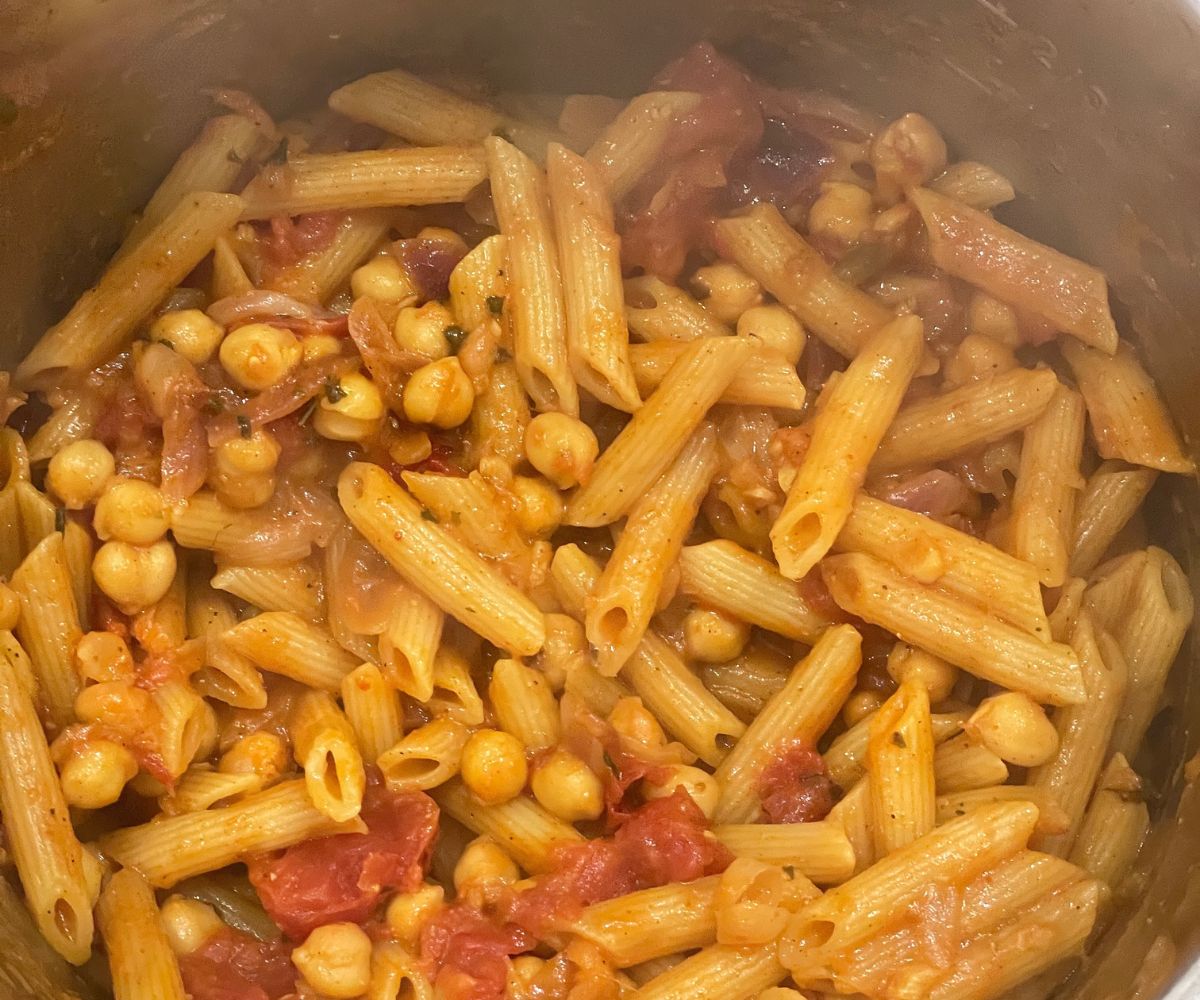 An instant pot has tikka masala pasta.