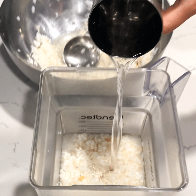 Blender filled with rice and water
