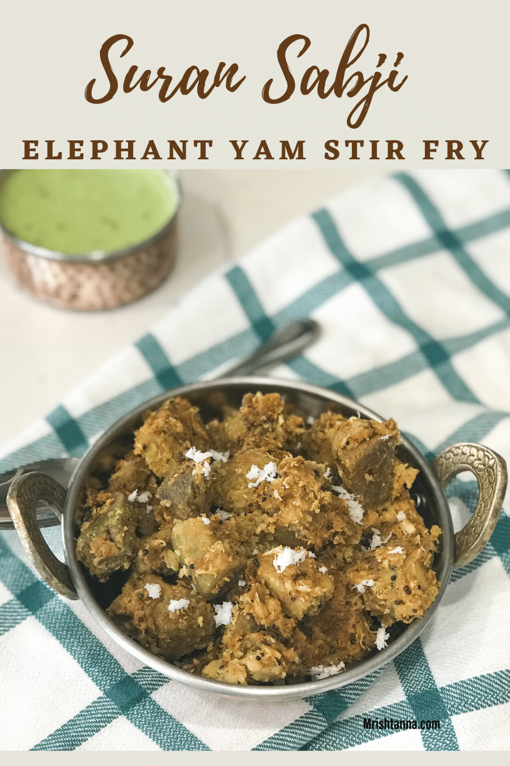 A bowl of yam on a table, with sauce