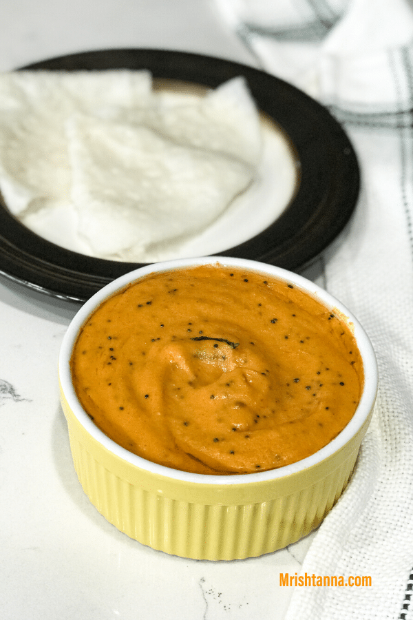 A plate of dosas, with Chutney and Tomato