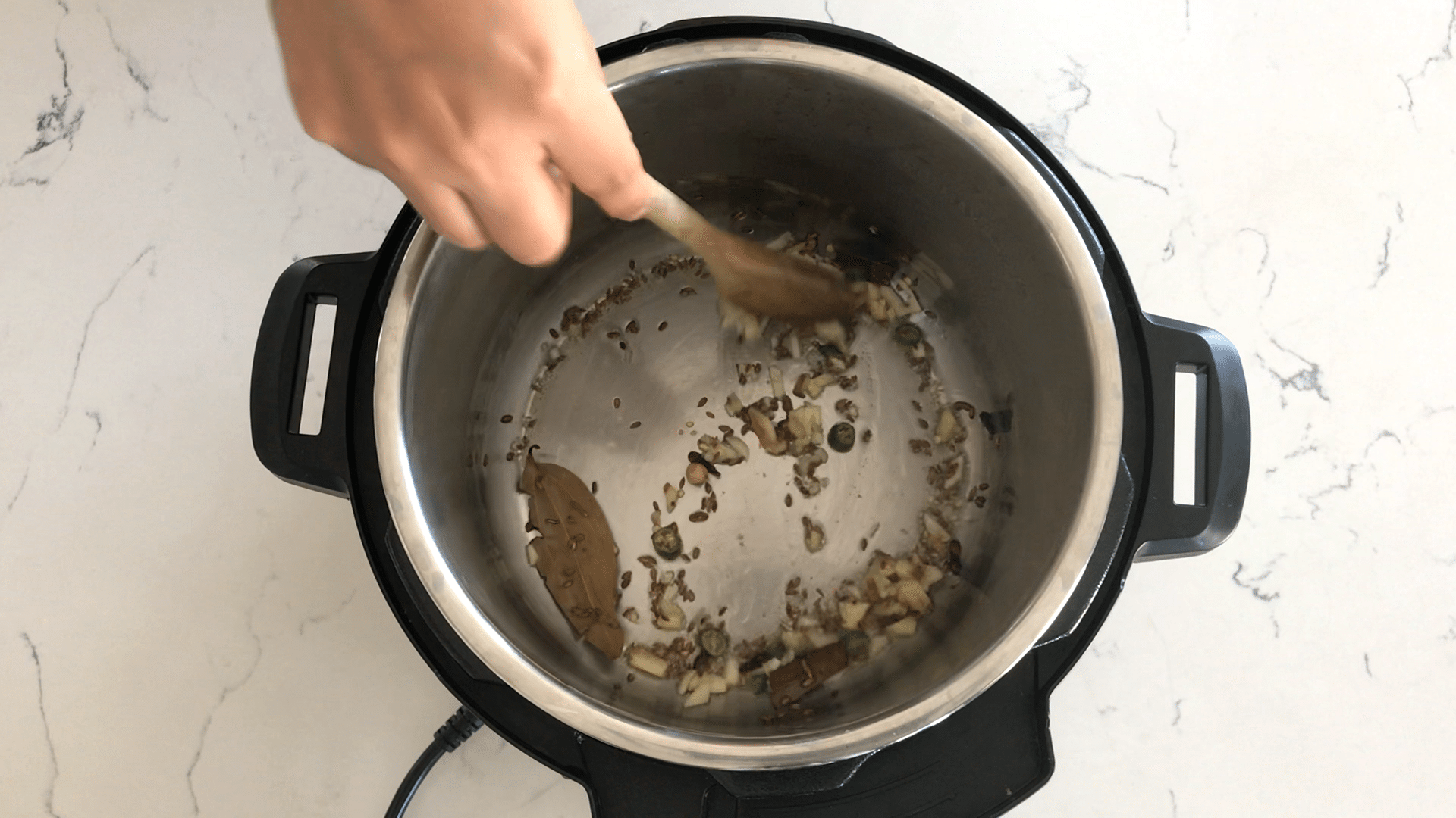 An instant pot with spices