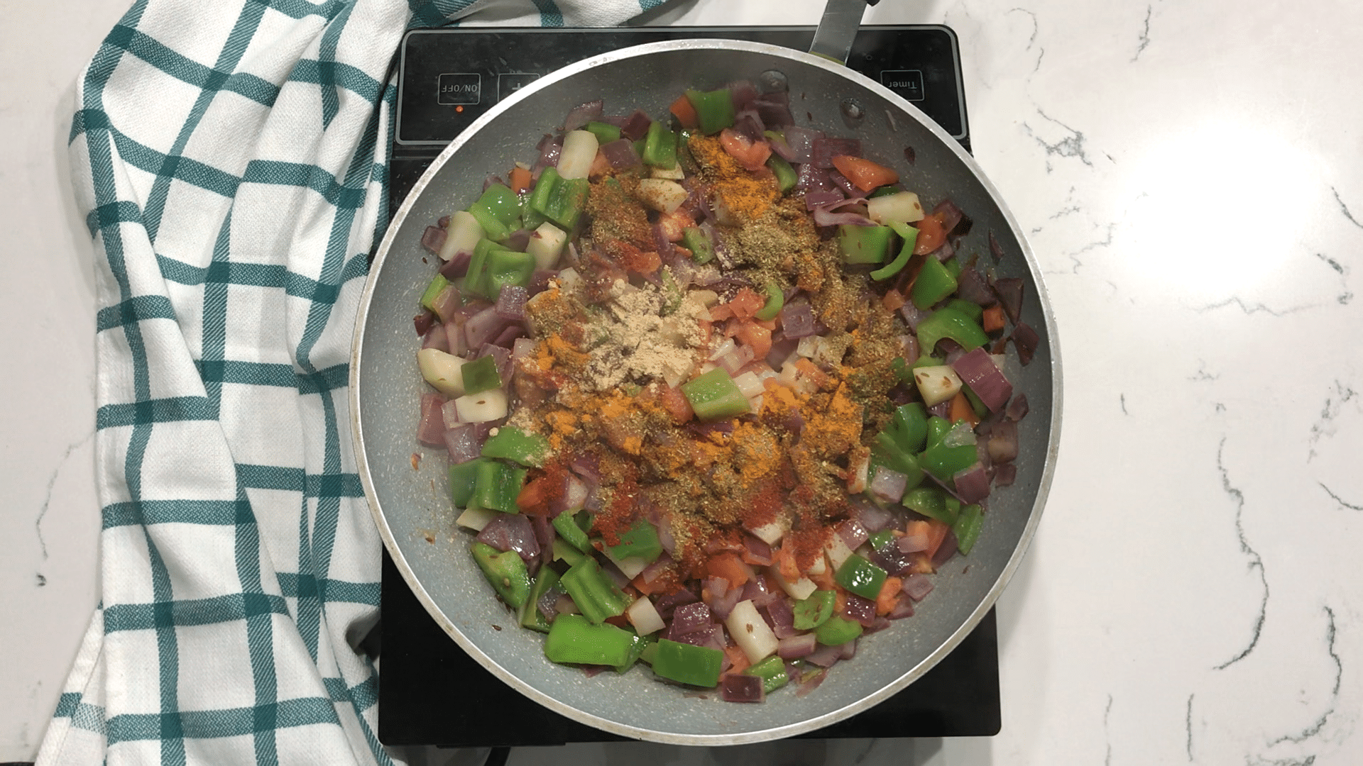 A pan of food, with Curry and Potato