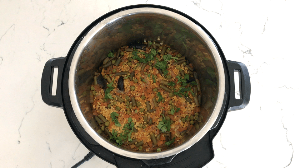 A bowl of food, with millet and Curry