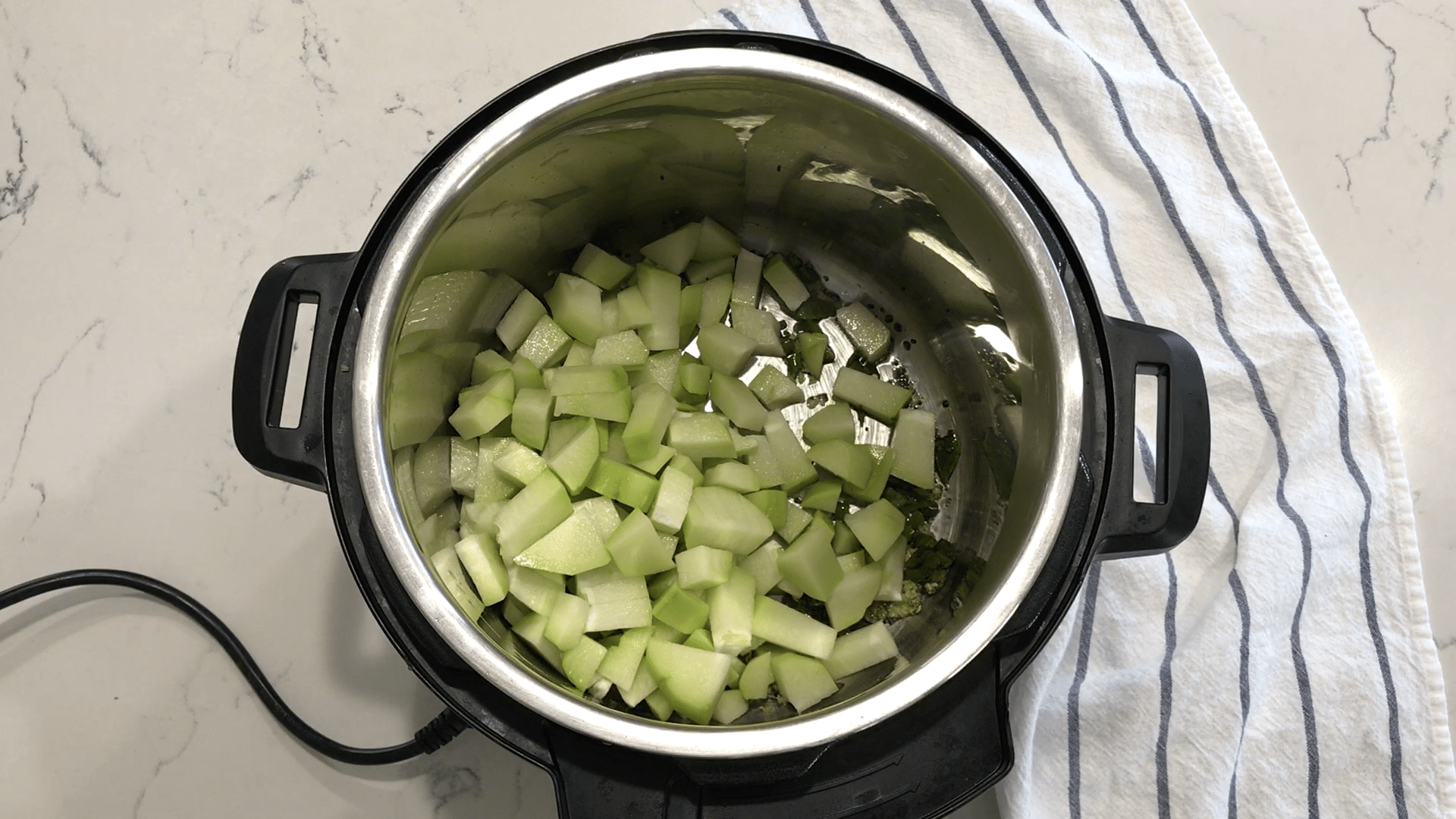 A bowl of Chayote and spices