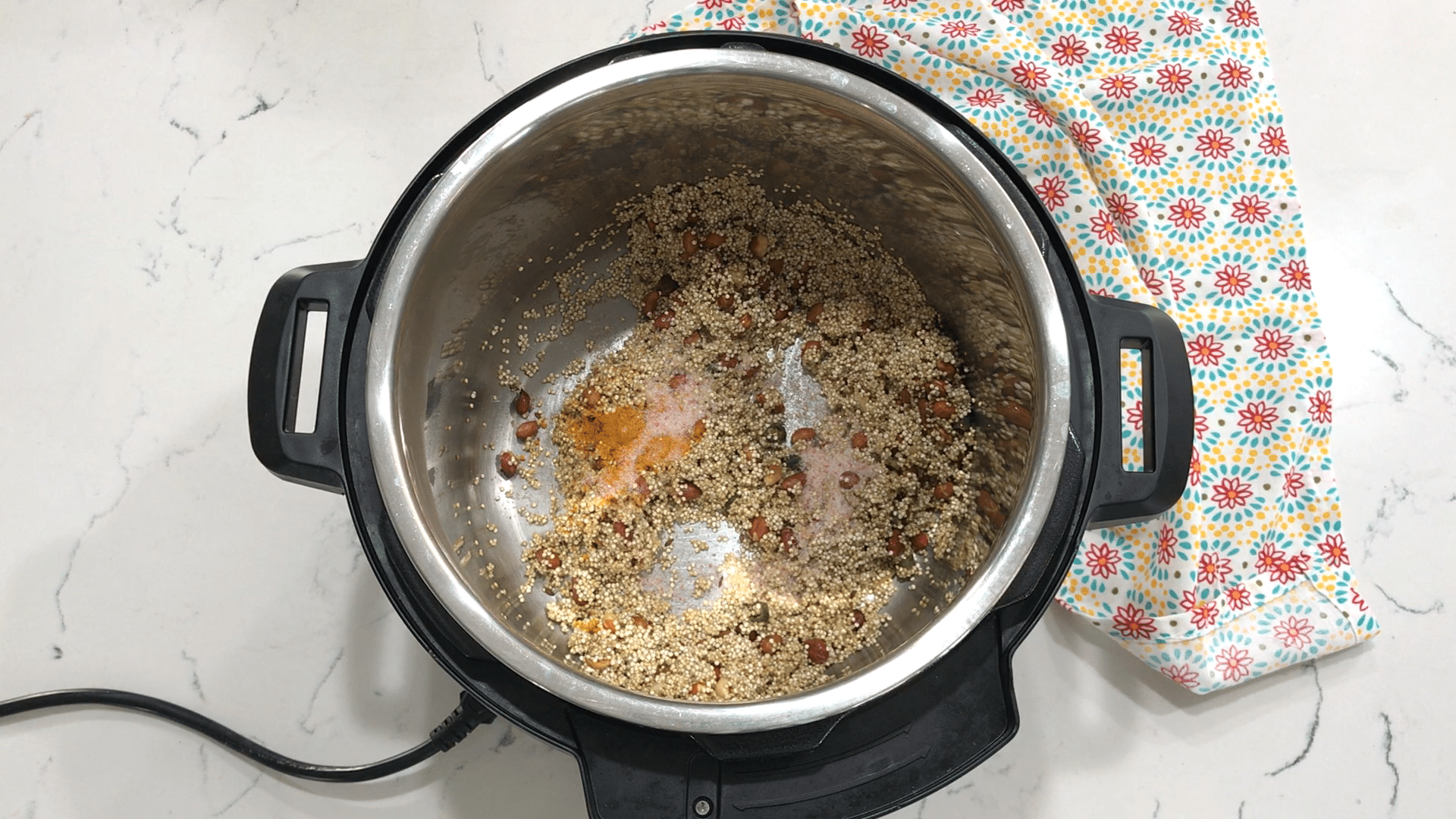 A bowl of food, with Quinoa and Lemon