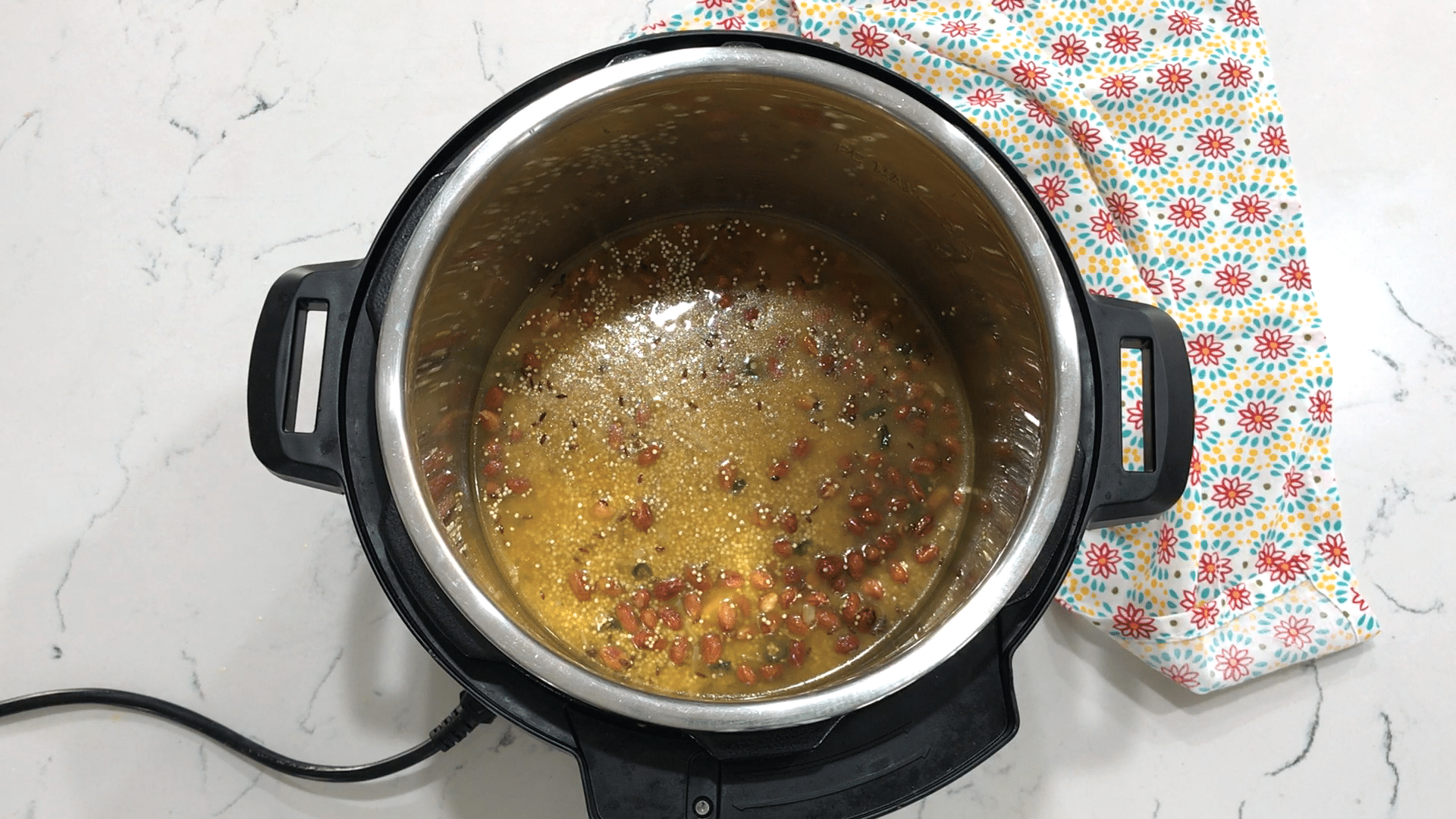 A bowl of food, with Quinoa and Lemon