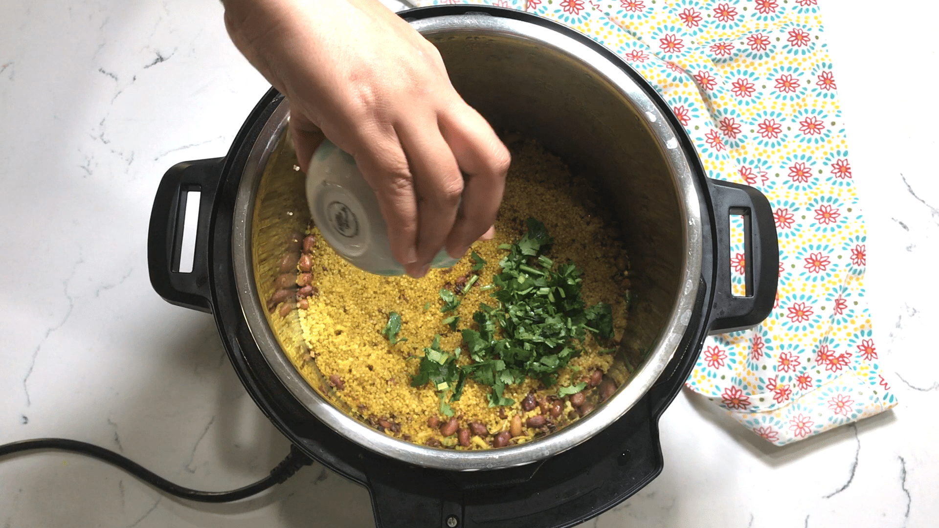 A bowl of food, with Quinoa and Lemon