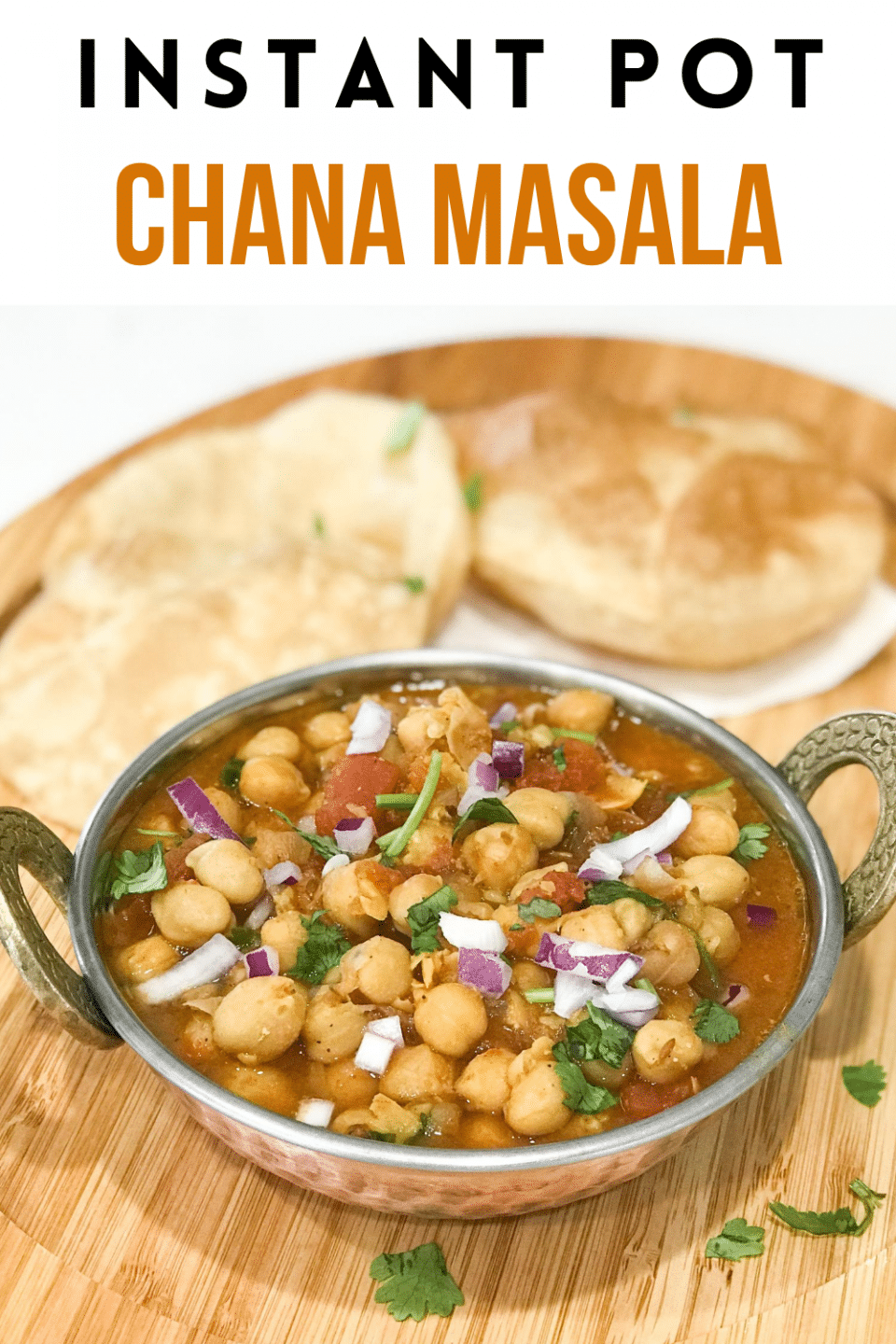 A bowl of food on a table, with Chana masala and Chickpea