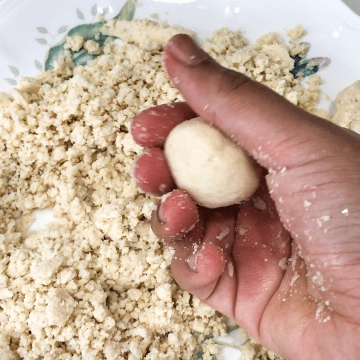 Almond ladoo shapping by hand.
