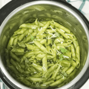 An instant pot is with vegan pesto pasta
