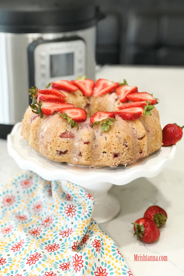 A piece of strawberry cake on a plate