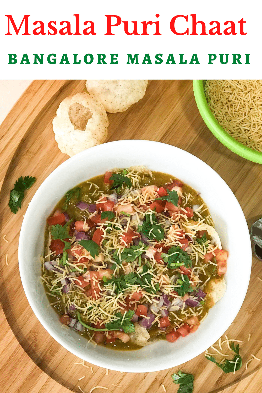 A bowl of food on a plate, with Chaat and Masala puri