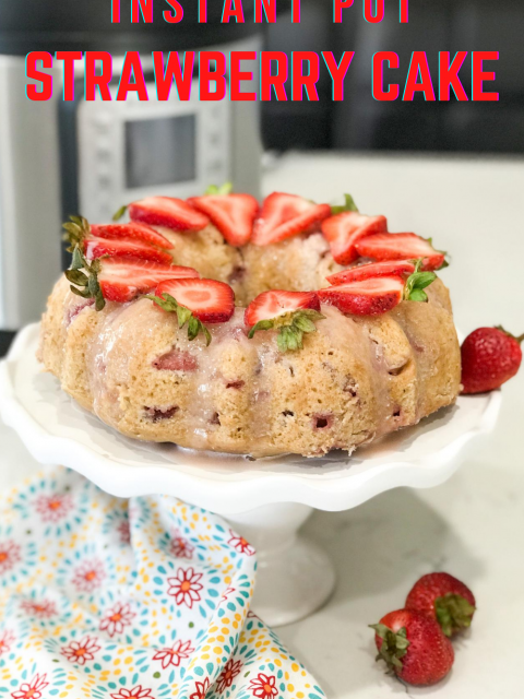 A piece of cake on a plate, with Strawberry cake