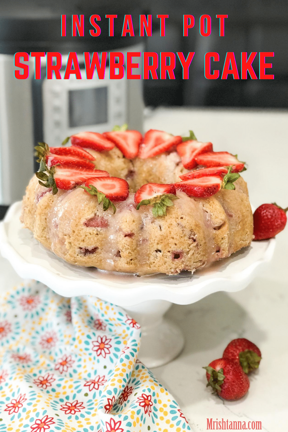 A piece of cake on a plate, with Strawberry cake