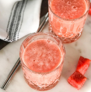 A glass Smoothie and watermelon