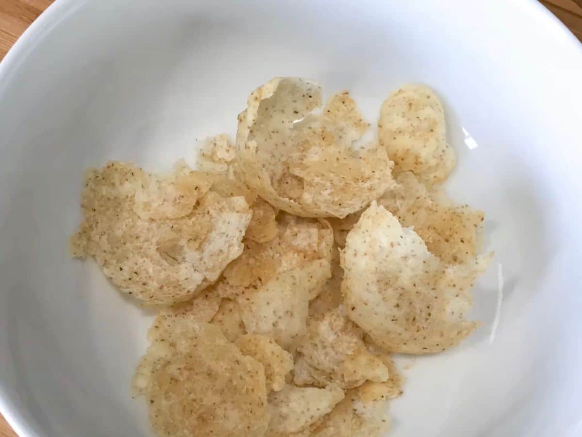 A bowl is with crushed puri's