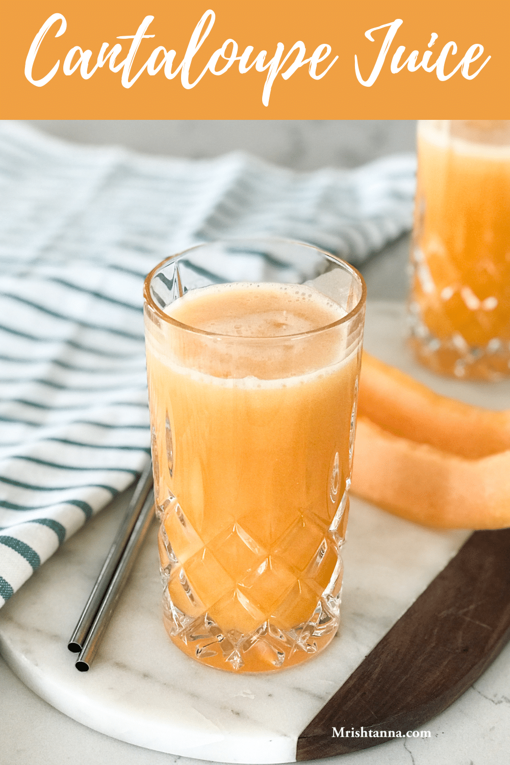 A glass of cantaloupe juice is on the table