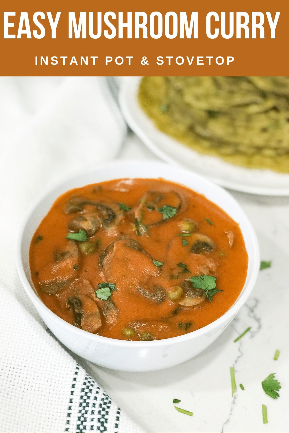 A bowl of mushroom curry is on the table