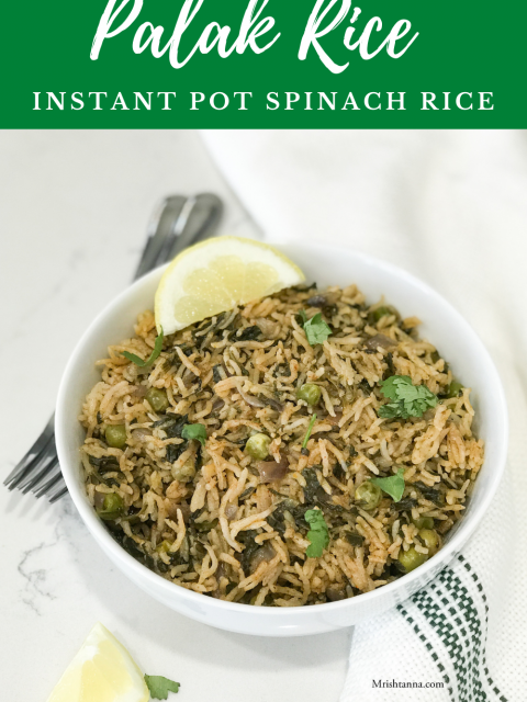 A bowl of rice served on the table with lemon and fork