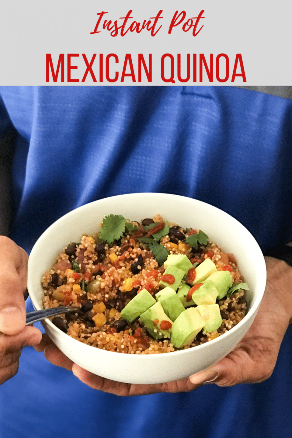 A man holding a bowl of mexican quinoa with a spoon