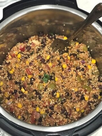 An instant Pot filled with quinoa and beans