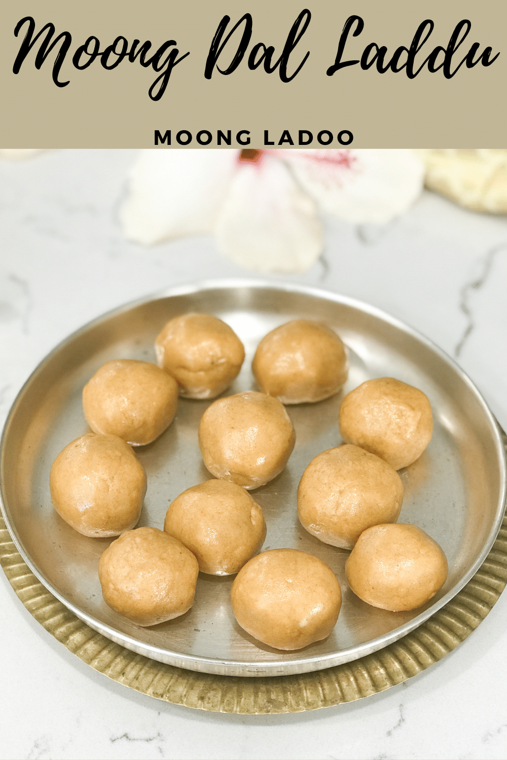 A silver plate filled with Moong laddu
