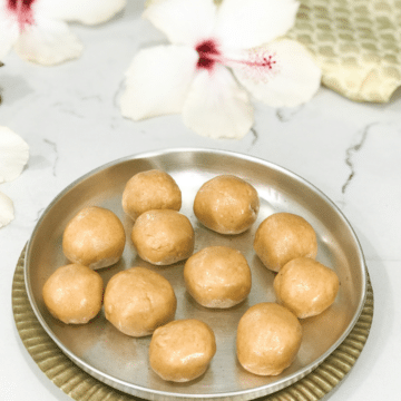 Moong laddus are placed in a sliver plate