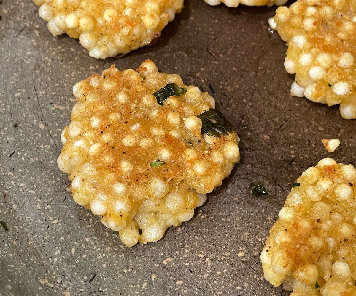 Sabudana vadas are in the pan frying.