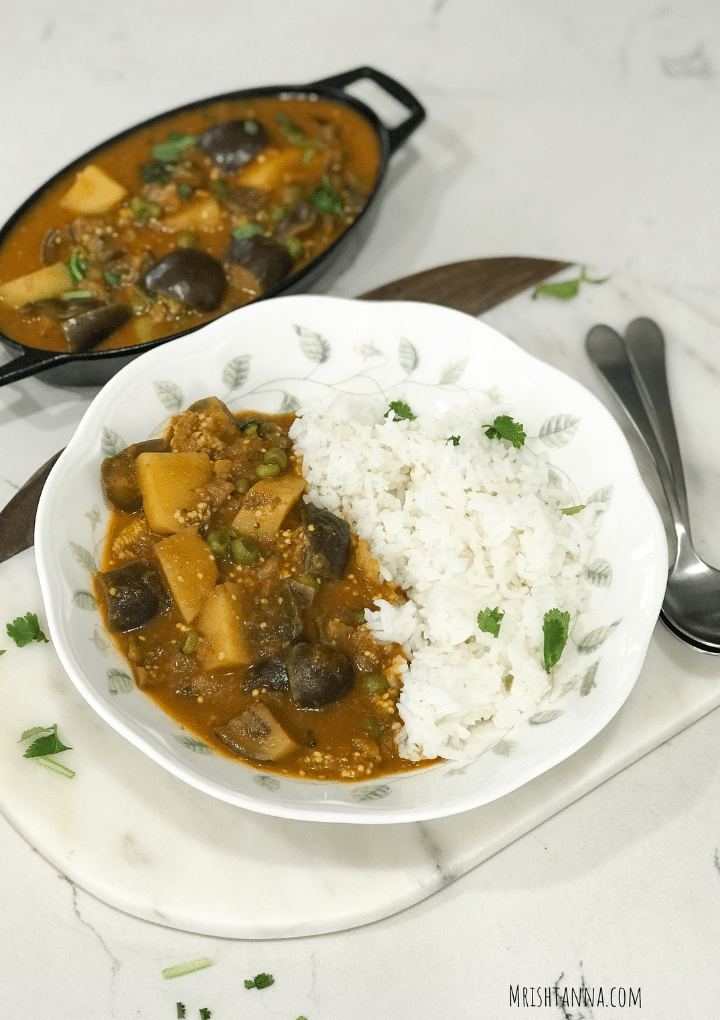 White rice and curry in a white plate